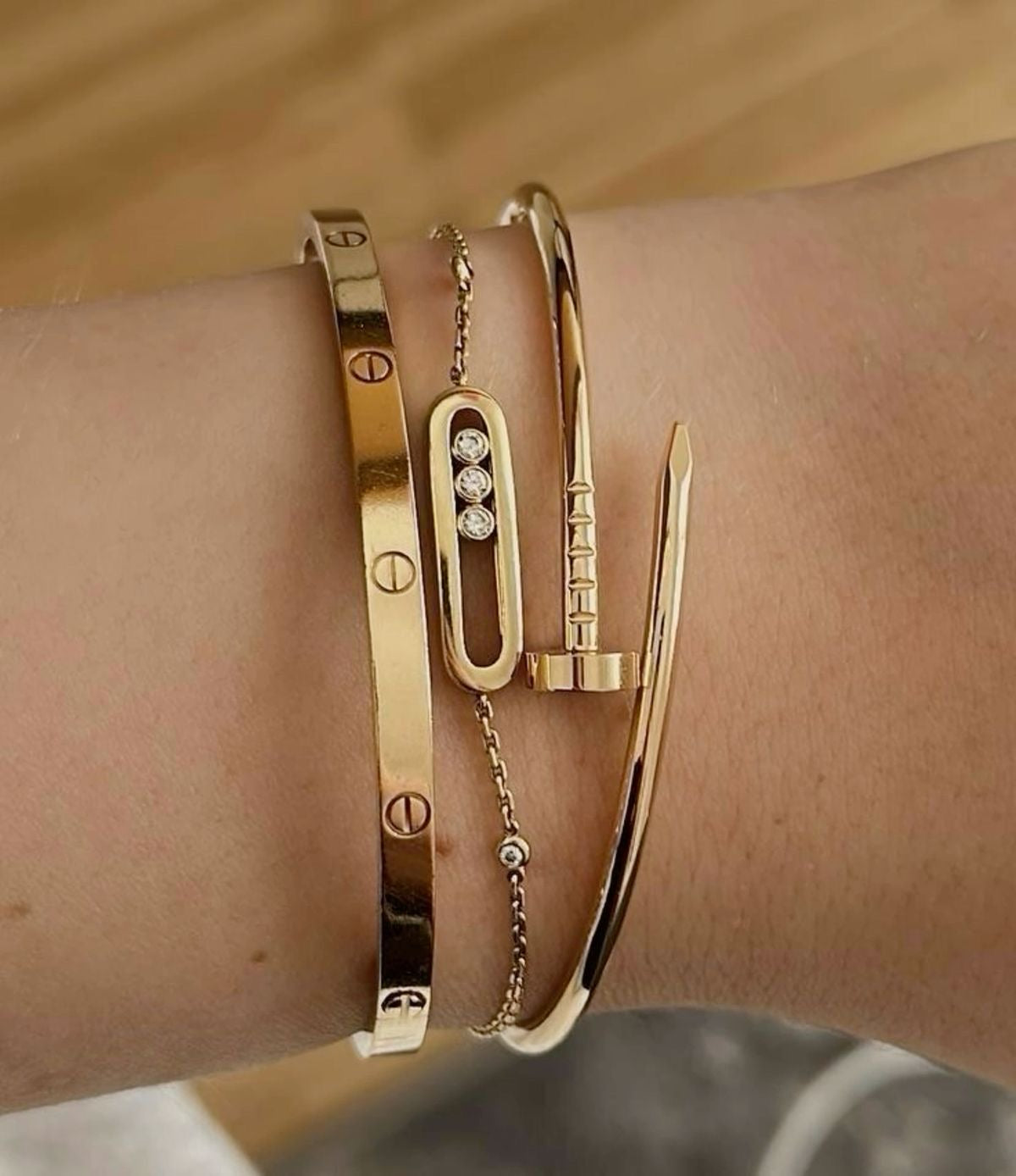 GOURMETTE MESSIKA + BRACELET CARTIER LOVE + BRACELET CARTIER CLOU